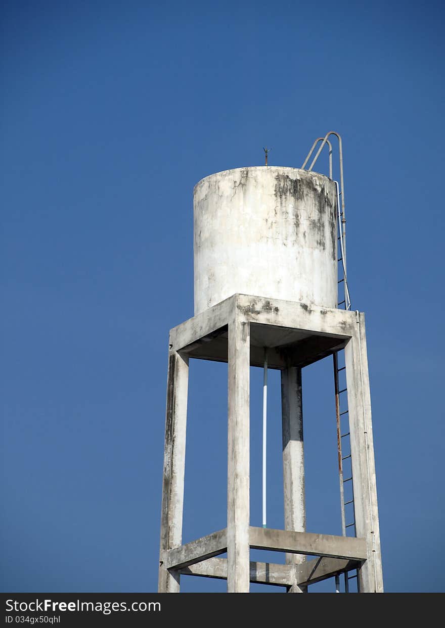 Old water tank with blue sky