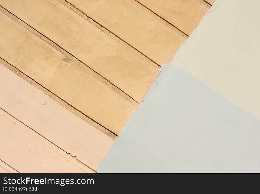 Multi-colored plaster wall with texture