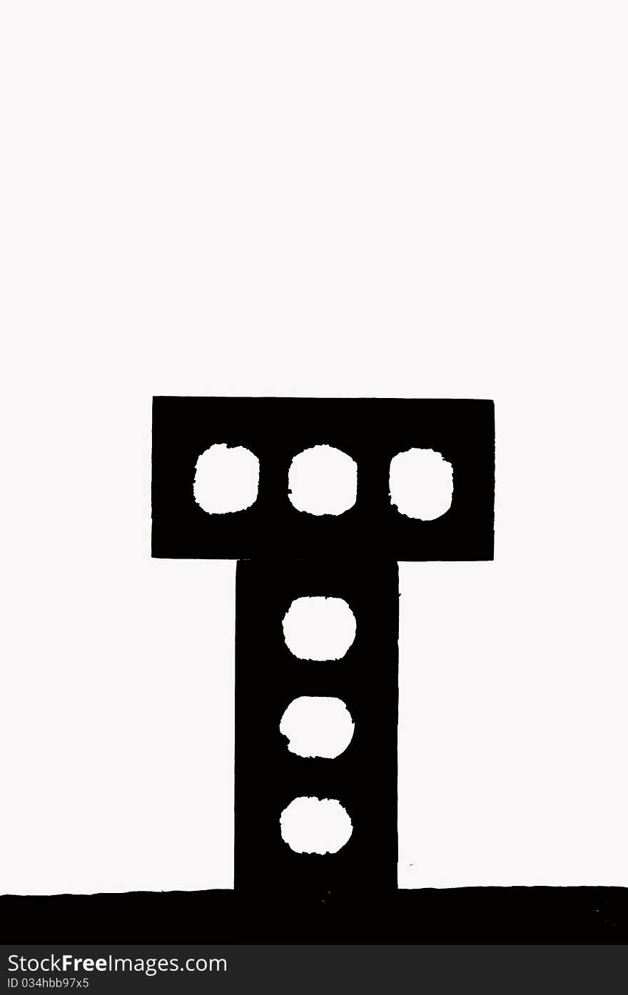 Perforated engineering bricks in shape of the letter t in silhouette against white background. Perforated engineering bricks in shape of the letter t in silhouette against white background