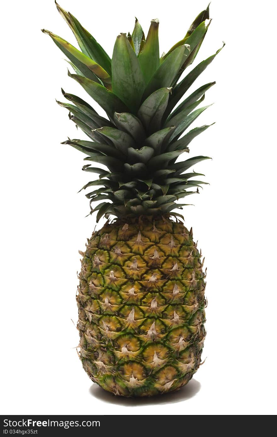 A pineapple set against a white background