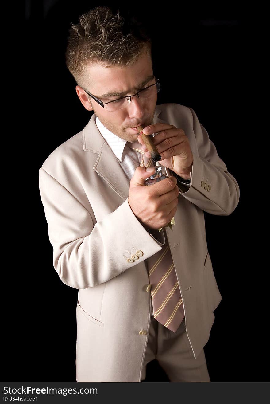 Businessman smoking cigar