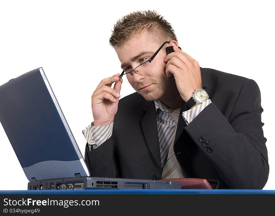 An elegant man in his daily work in the office. An elegant man in his daily work in the office.