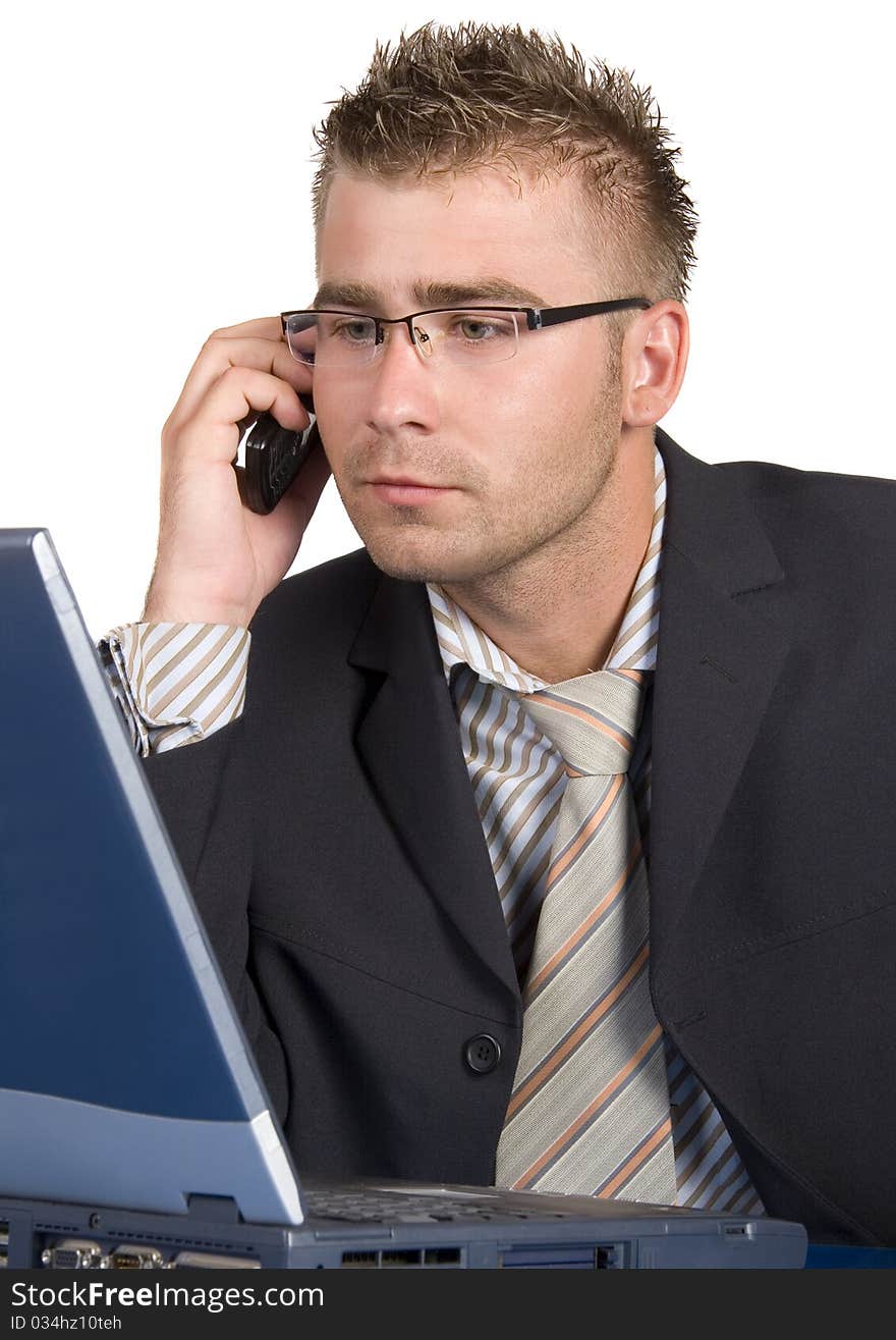 An elegant man in his daily work in the office. An elegant man in his daily work in the office.