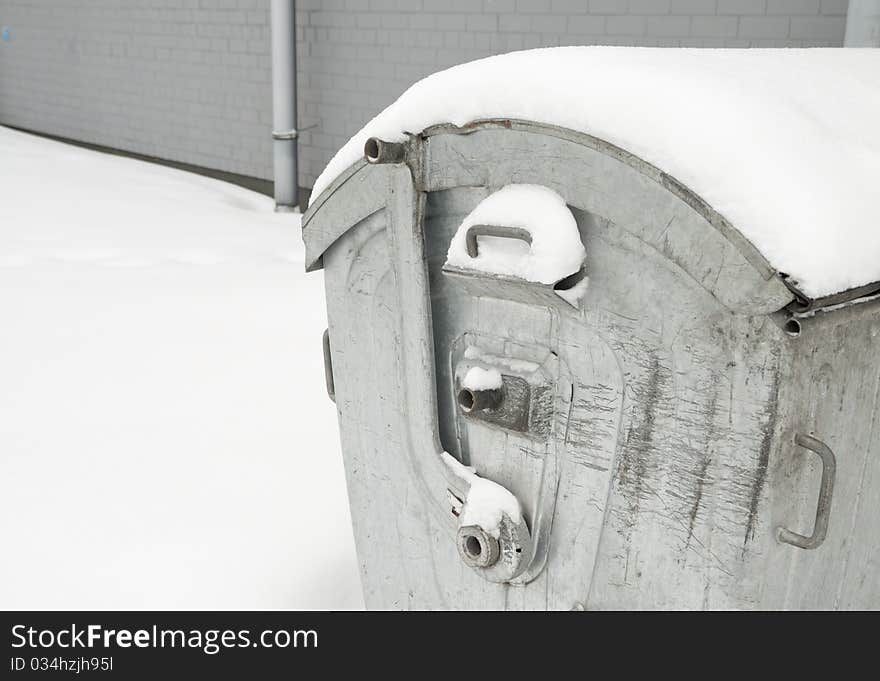 Metal dust bin in winter. Metal dust bin in winter