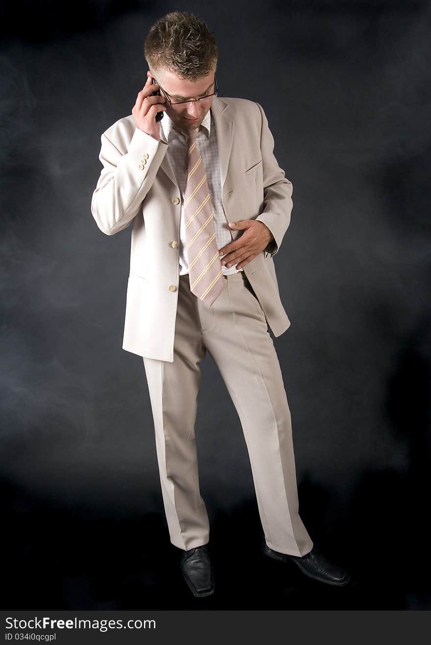 Businessman smoking cigar