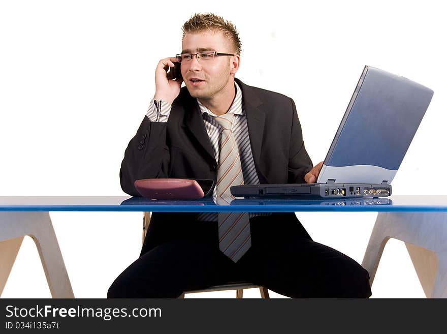 An elegant man in his daily work in the office. An elegant man in his daily work in the office.