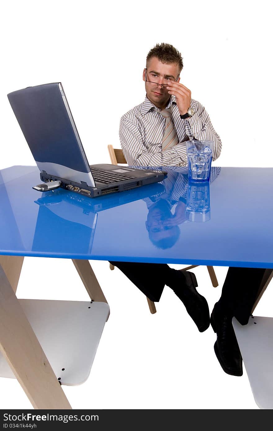 Elegant businessman working on his office. Elegant businessman working on his office