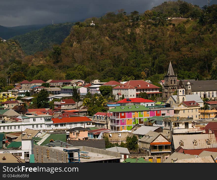 Tropical colored architecture in a Dominica port. Tropical colored architecture in a Dominica port.