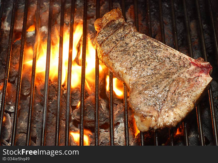 Steak on the fire grill. Steak on the fire grill