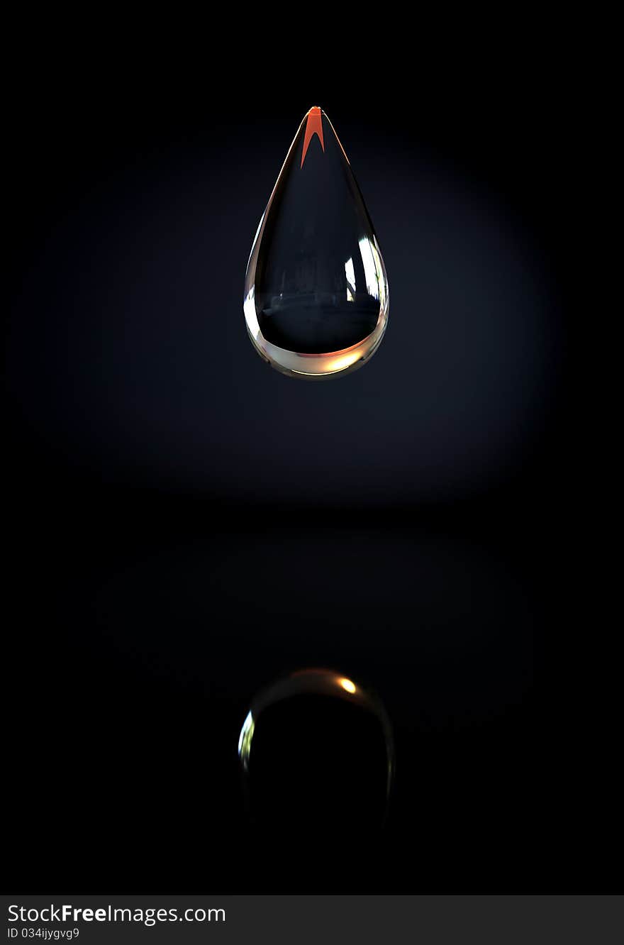 A drop of water on a black background with reflection