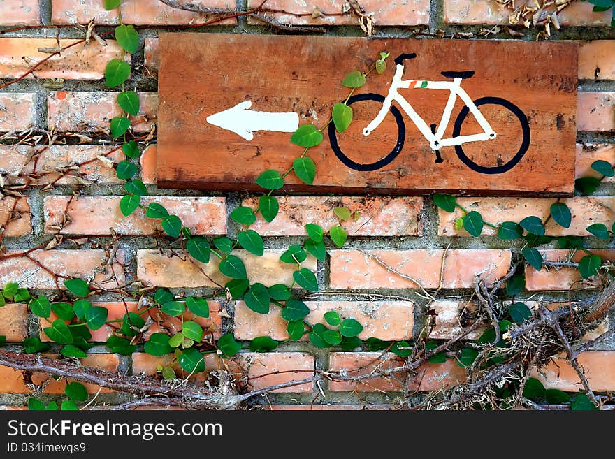 Brick wall with bicycle plate