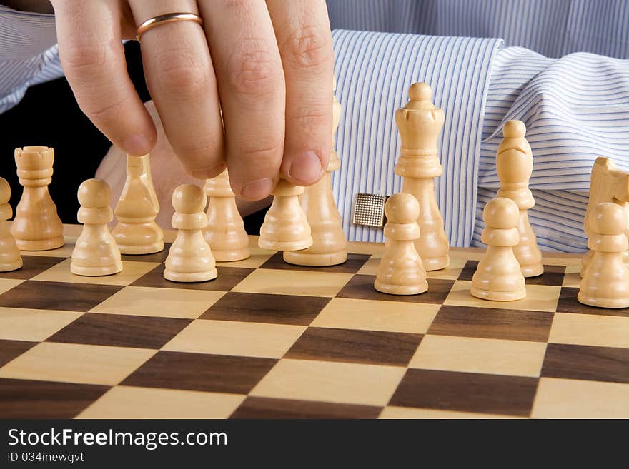 Hand Moving Chess Piece