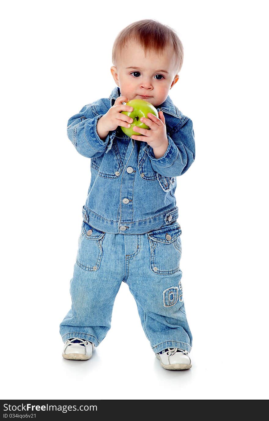 Baby with green apple. Isolated on white background