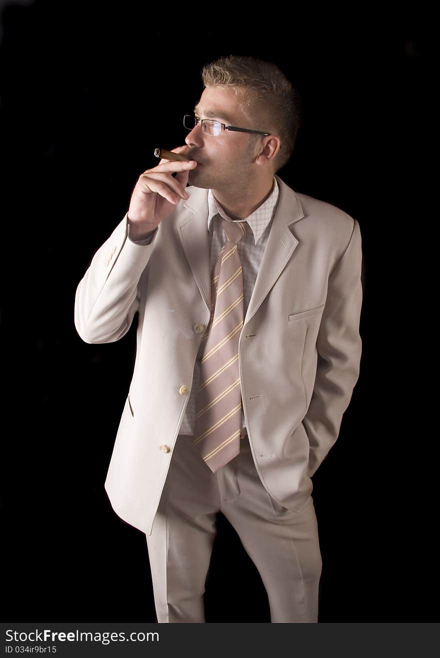 Businessman smoking cigar