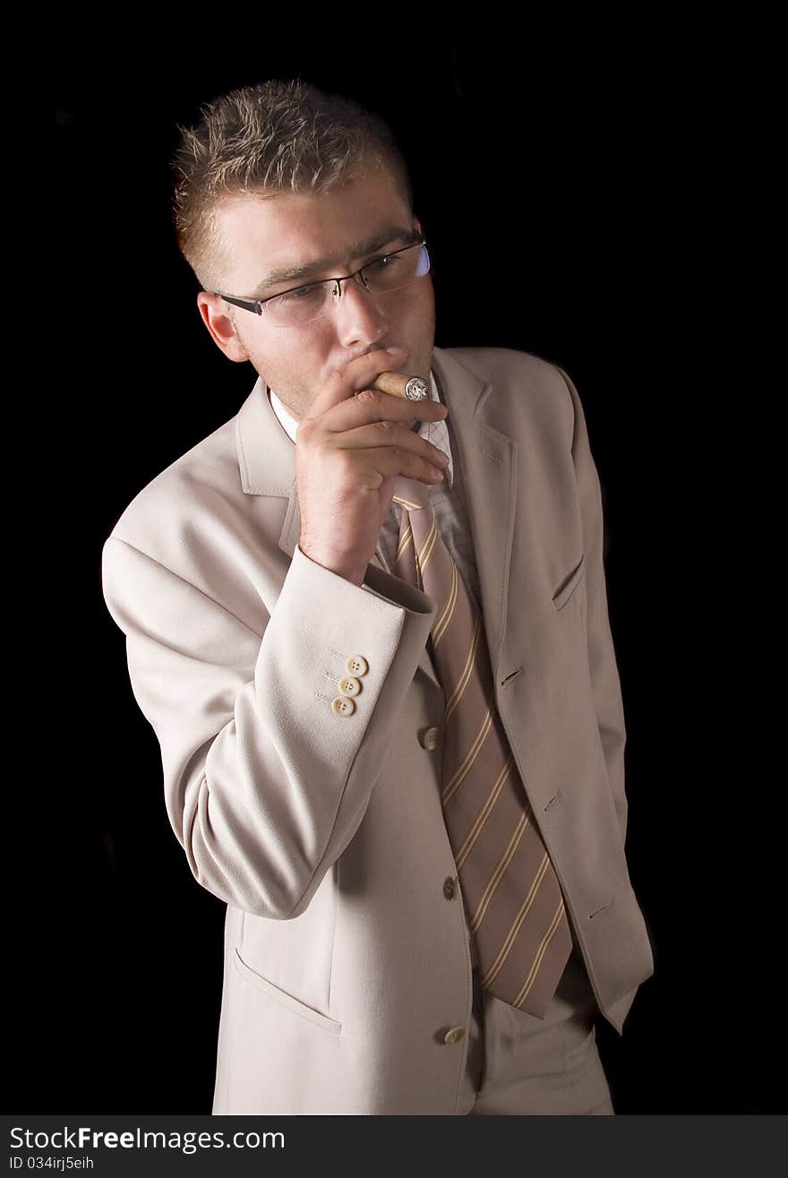 Businessman smoking cigar