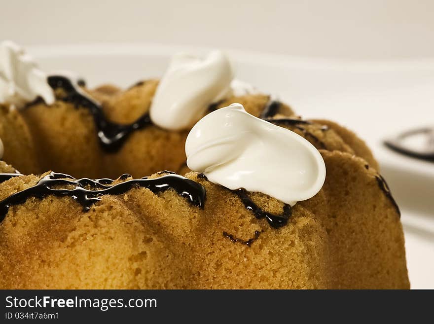 Doughnut topped up with dairy cream.