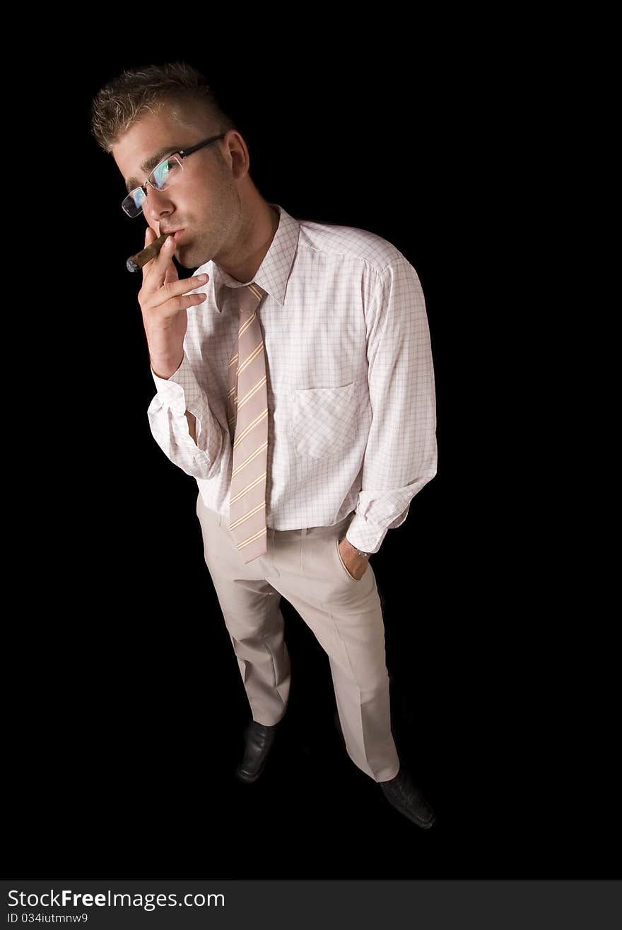 Businessman smoking cigar