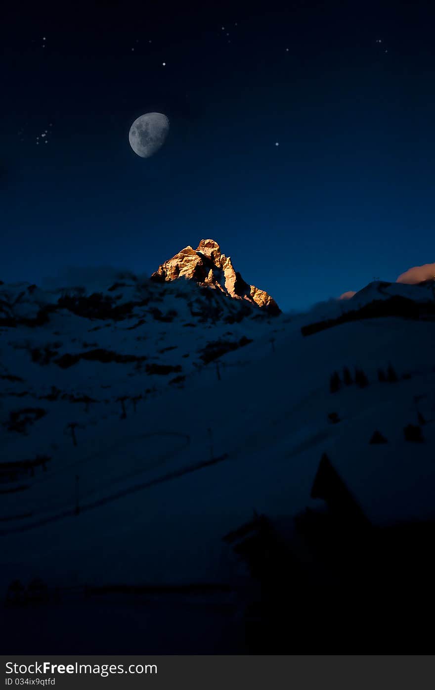 Moon on the matterhorn, italian alp.