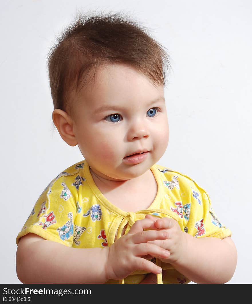 The small child on a white background