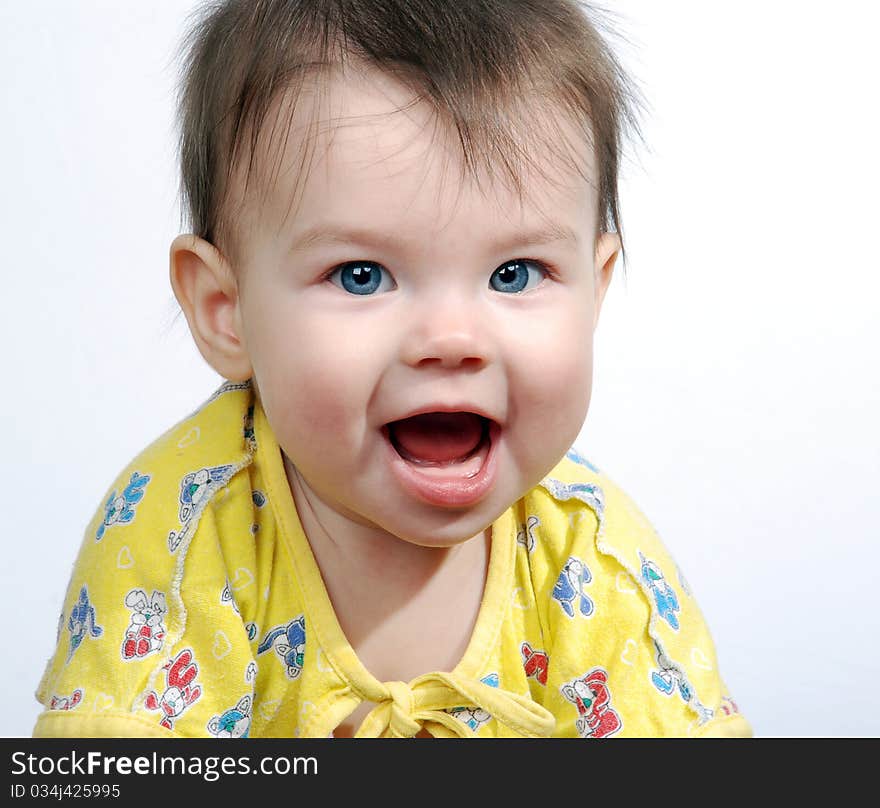 The small child on a white background