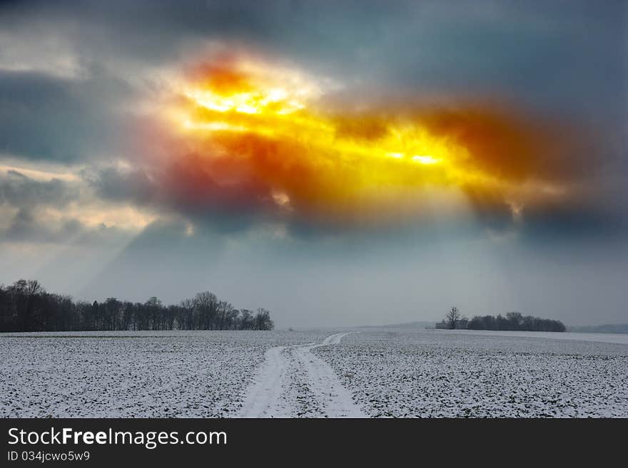 Winter landscape with gray clouds