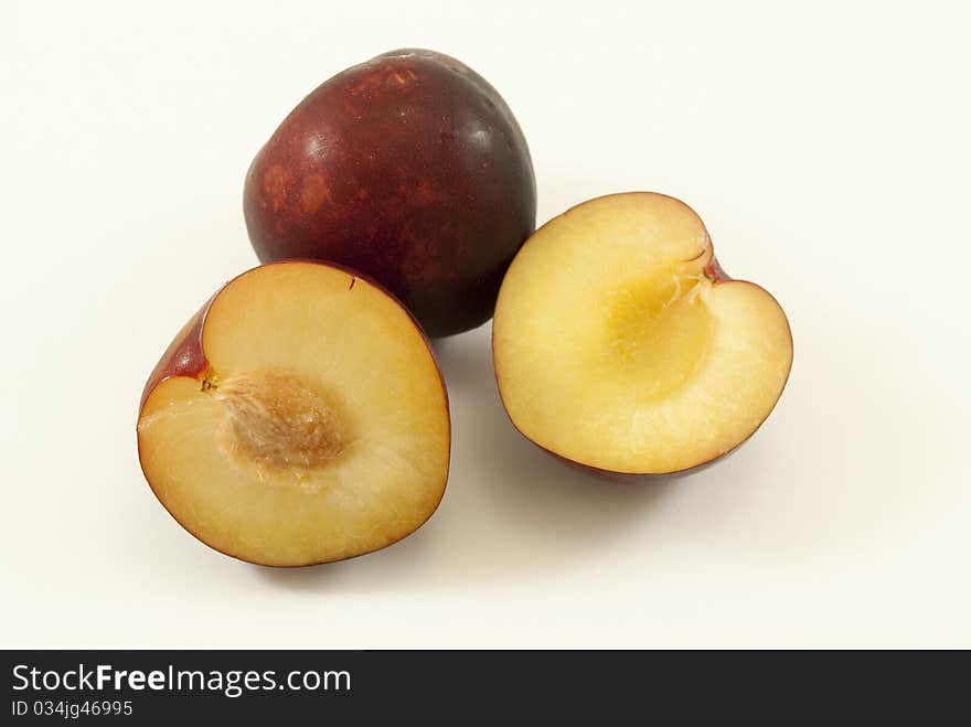 Plums isolated on white background