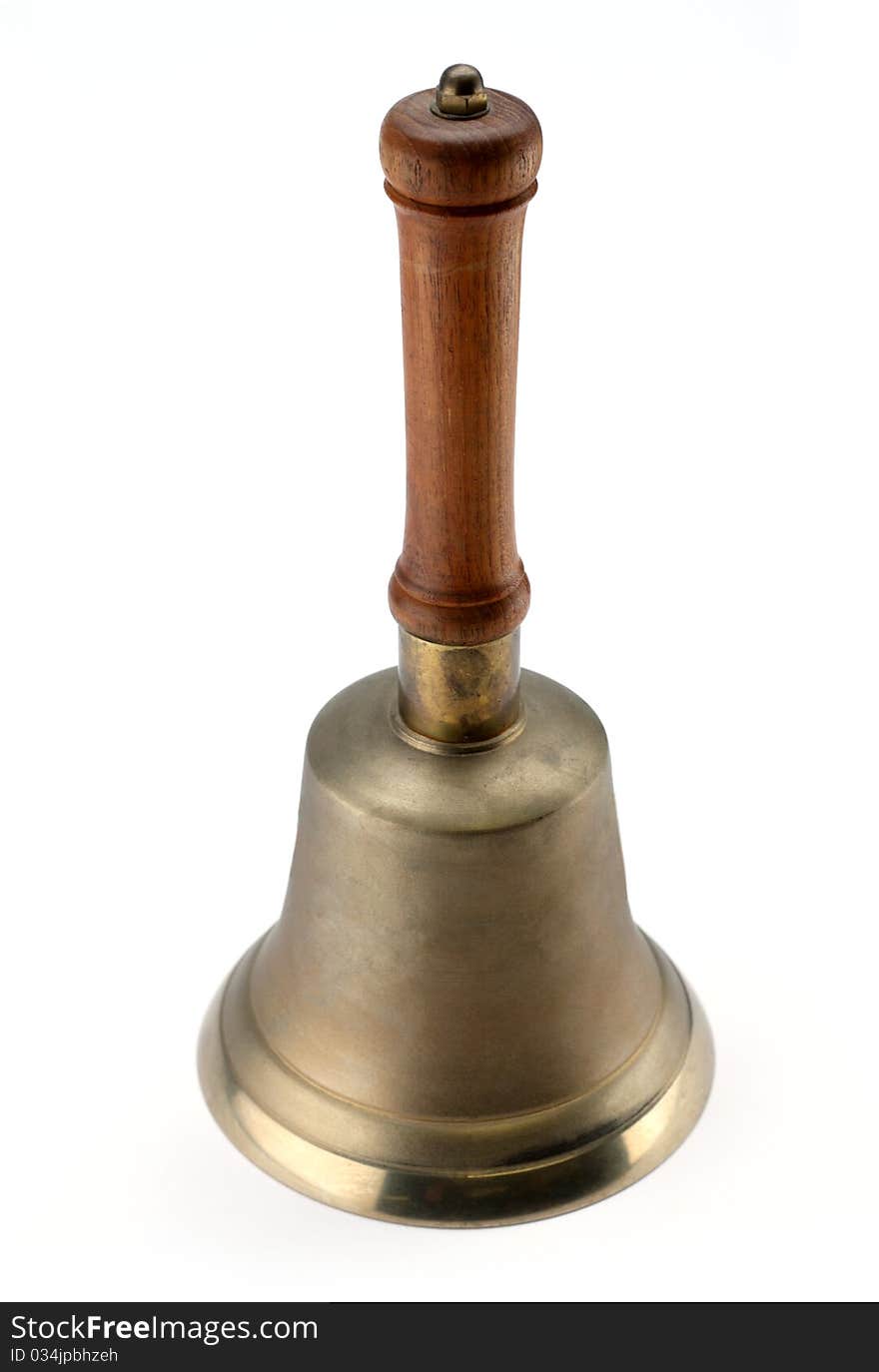 Isolated old hand bell portrait. Isolated old hand bell portrait