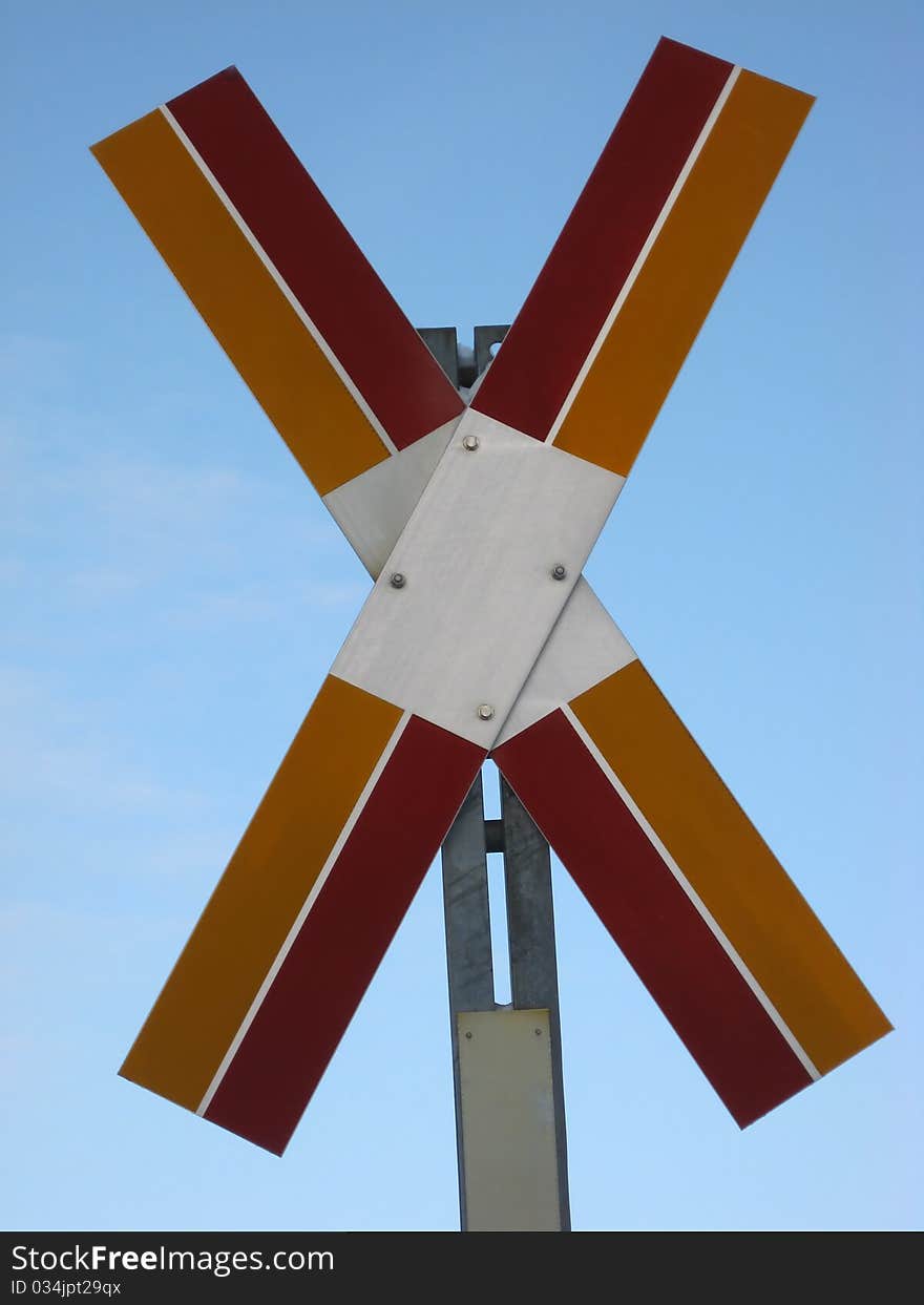 Unknown sign closeup in the blue sky. Unknown sign closeup in the blue sky