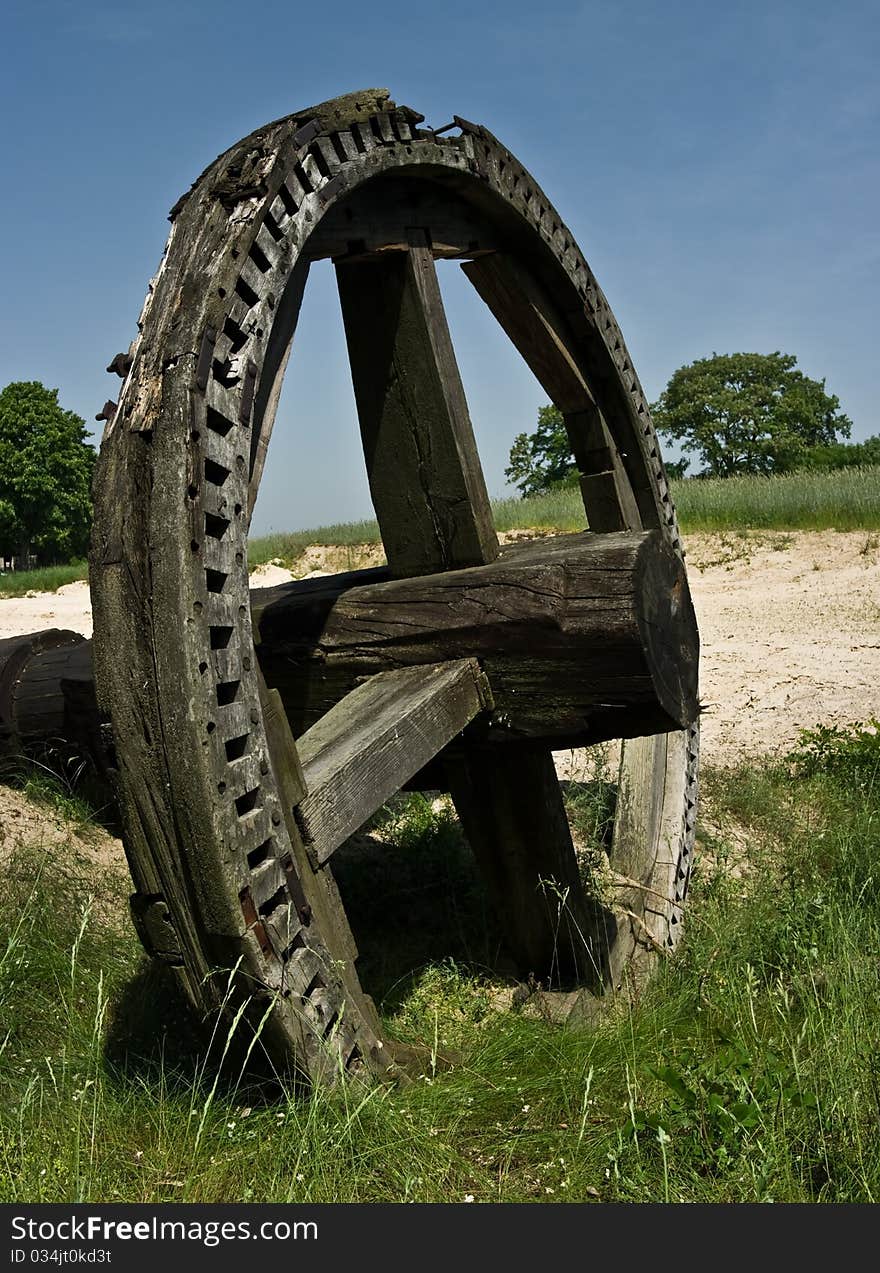 Wooden wheel - remnant of a windmill. Wooden wheel - remnant of a windmill