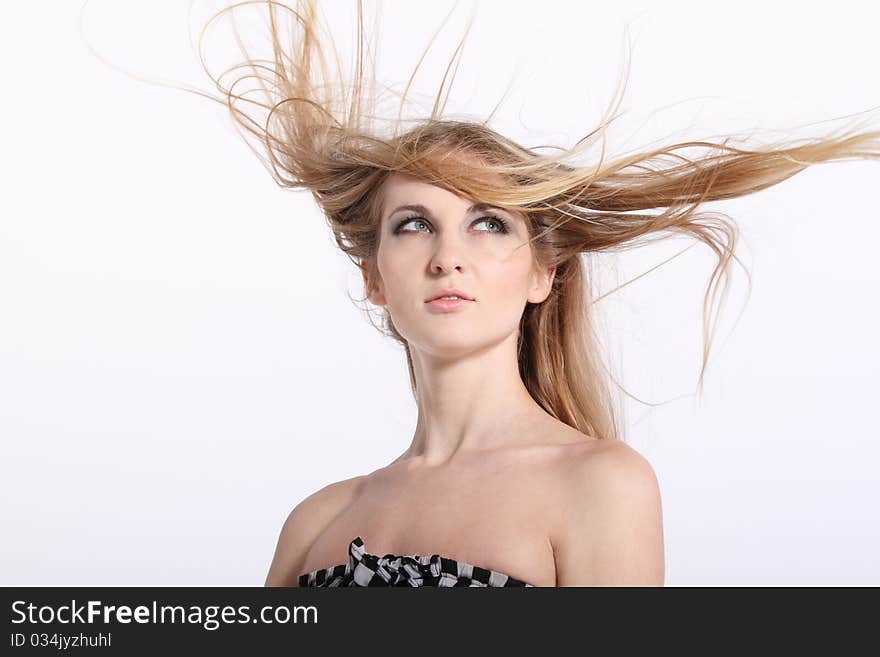 Portrait of young beauty woman with fluttering hair. Portrait of young beauty woman with fluttering hair