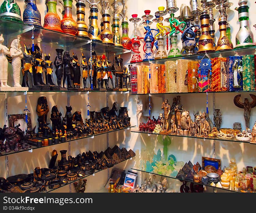 Glass shelves with Egyptian souvenirs