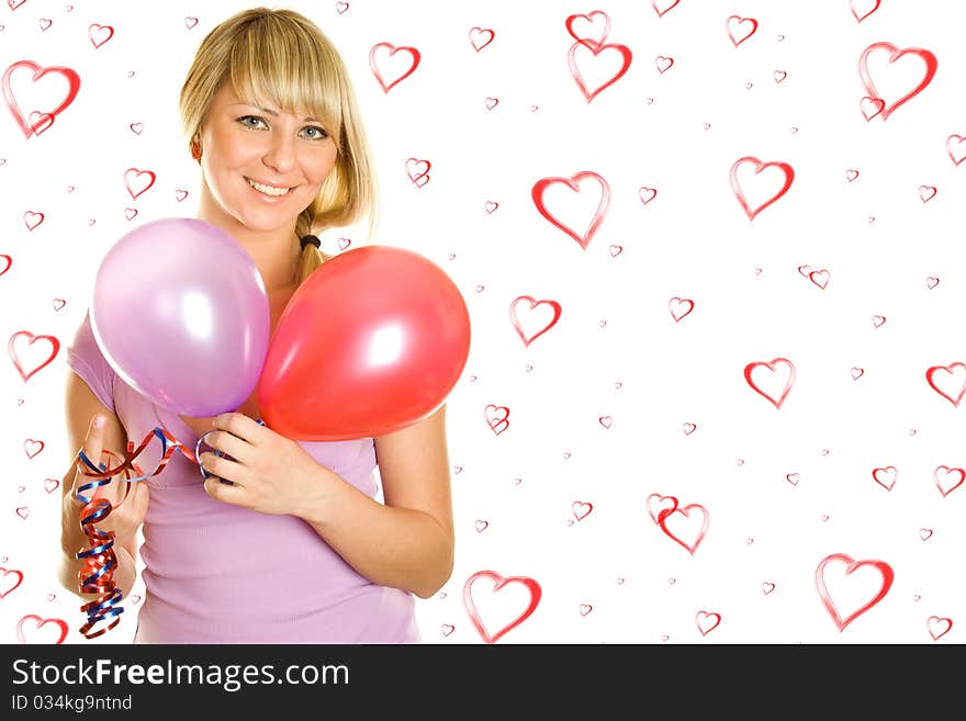 Close-up of a beautiful young woman with colorful balloons balloons. On the background of red hearts. Close-up of a beautiful young woman with colorful balloons balloons. On the background of red hearts