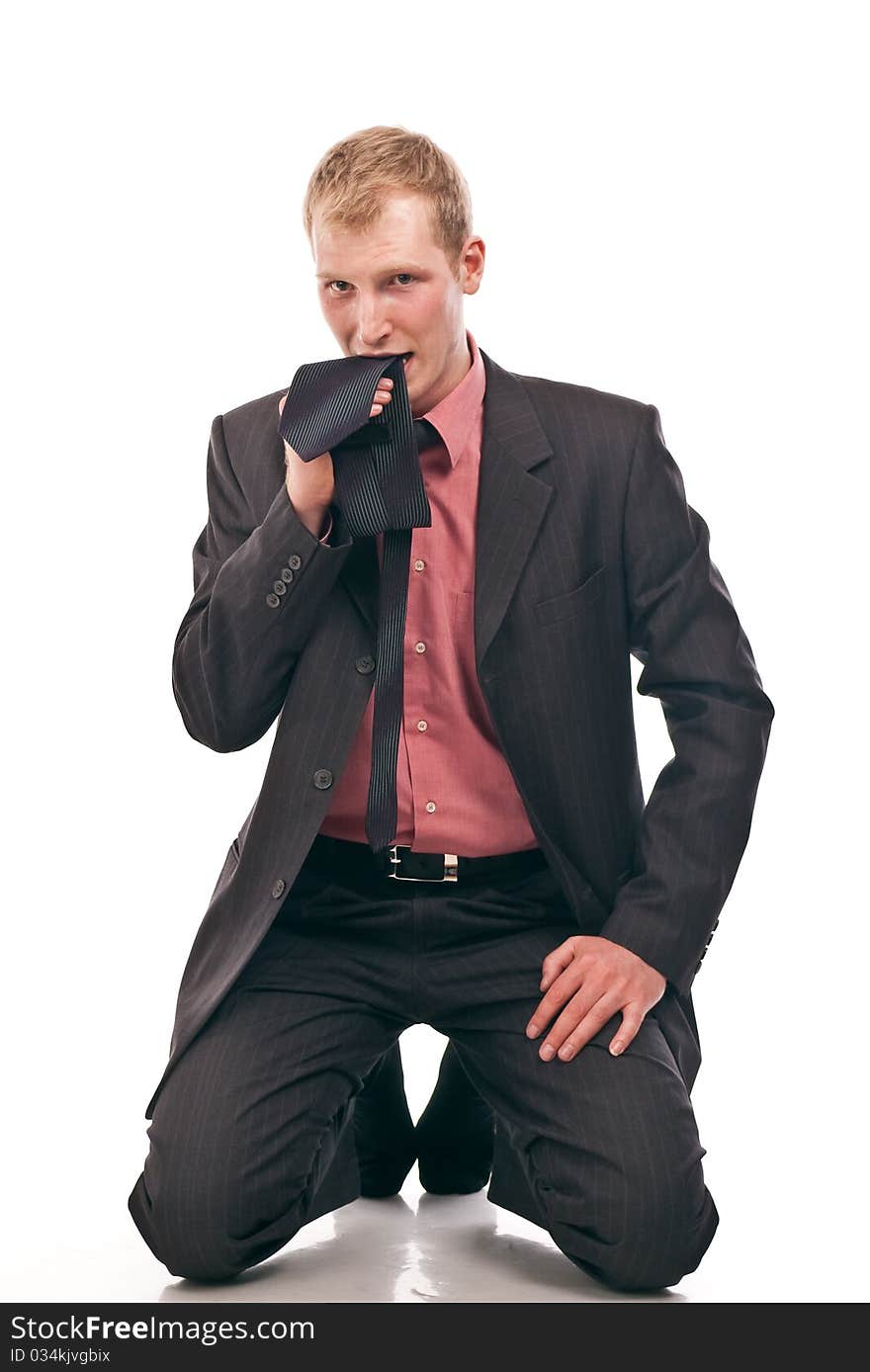 Businessman is kneeling