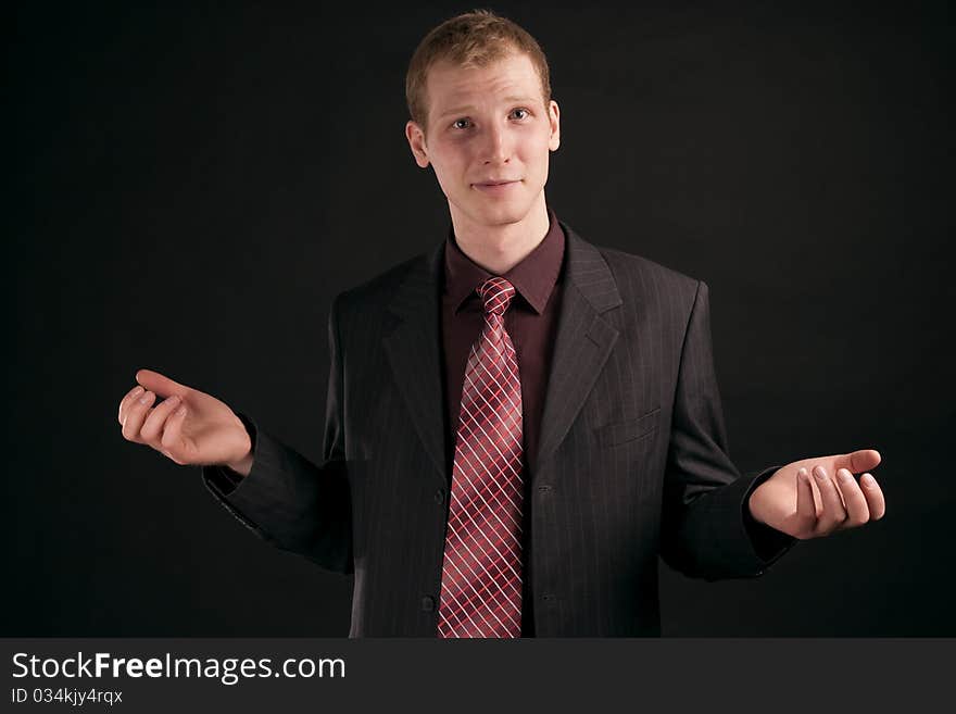 Portrait adult guy on black backout