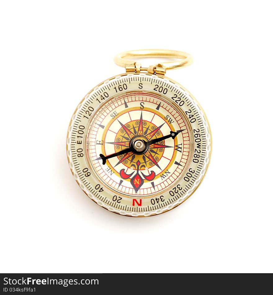 Old styled, gold compass on a white background.