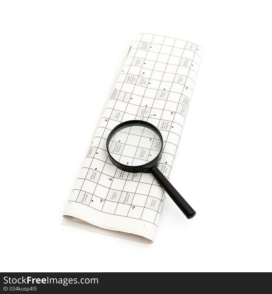 A magnifying glass focusing on a graph in the business section of the newspaper. A magnifying glass focusing on a graph in the business section of the newspaper.