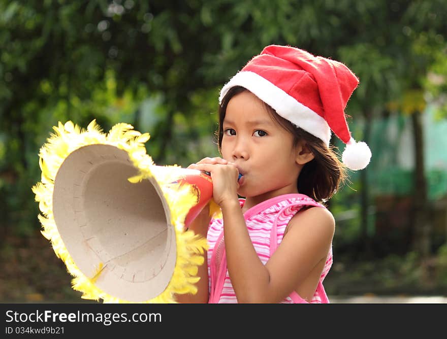 Little asian girl celebrating christmas. Little asian girl celebrating christmas