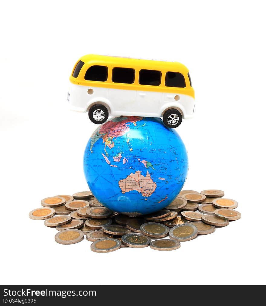 Globe And Car On The Pile Of Coins - Isolated