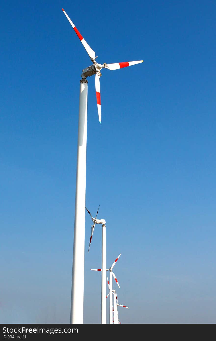 Row of windmill and blue sky