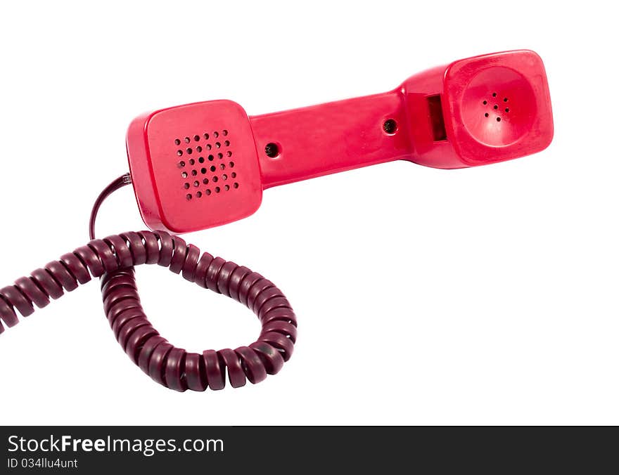 Red telephone handset on a white background