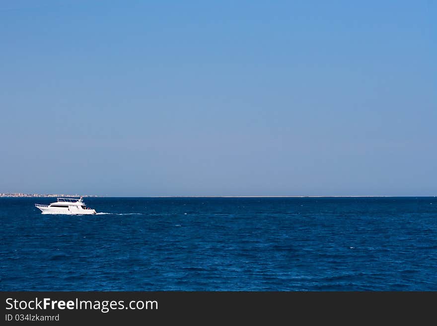 White ship on blue sea