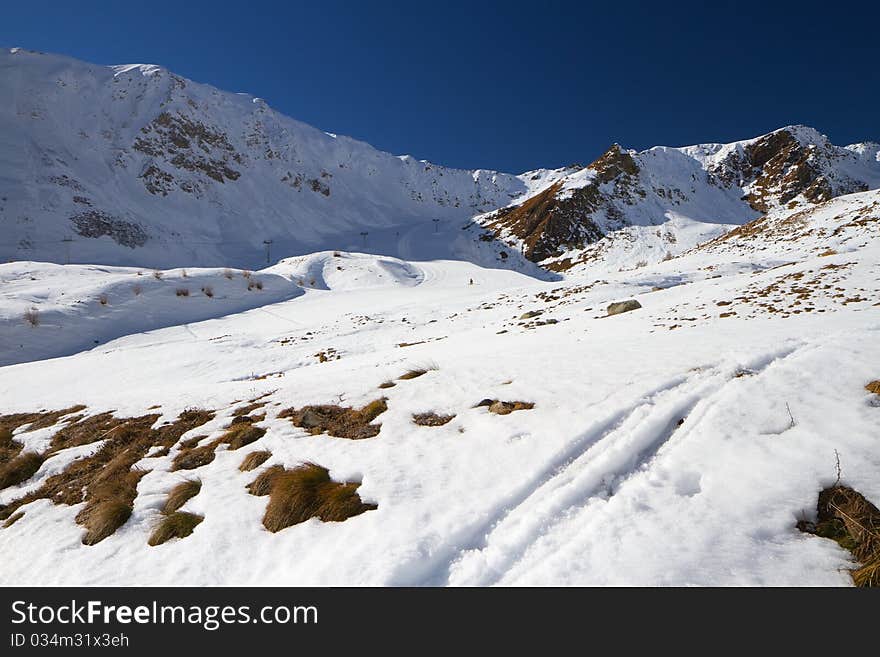 Tonale Pass at 1884 meters on the sea-level, after a winter snowfall. Trento province, Trentino-Alto Adige region, Italy. View of Tonale Occidentale ski run