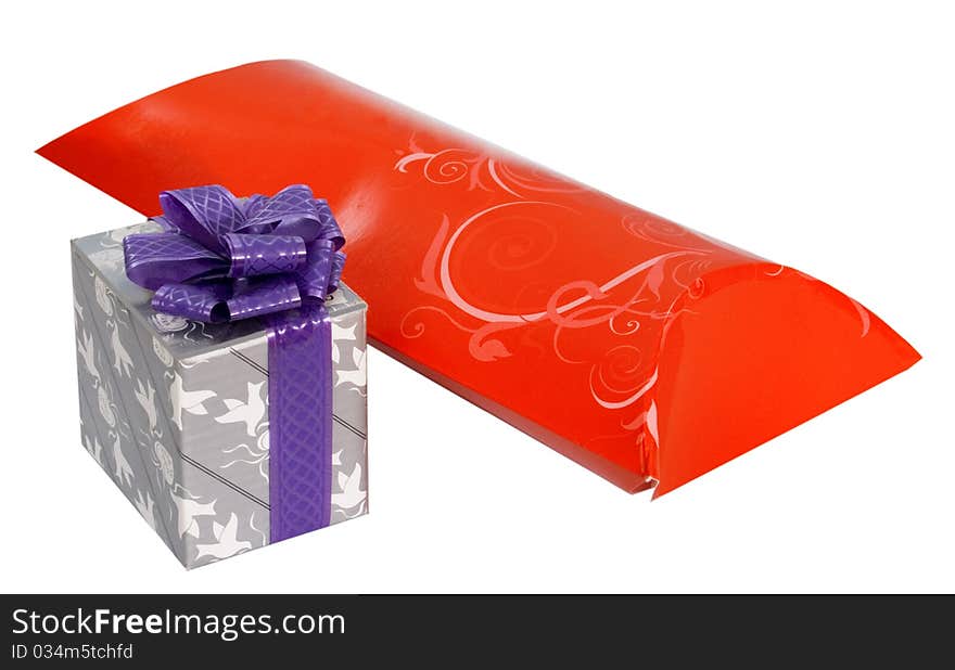 Red and silver box with gifts for Christmas. photo on a white background. Red and silver box with gifts for Christmas. photo on a white background.