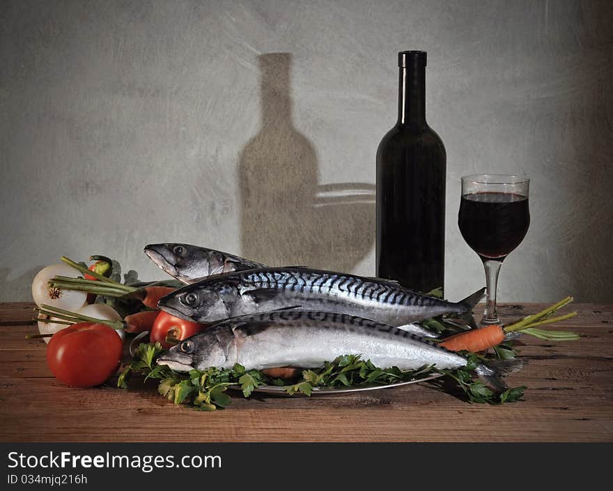 A raw dinner with wine and fish