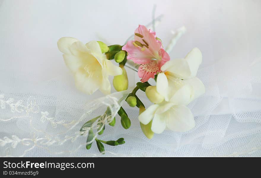 Freesia decor on wedding dress