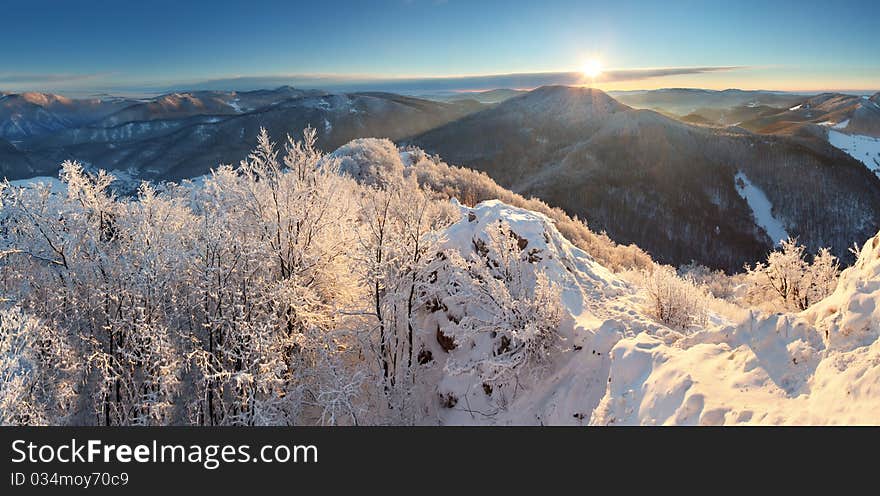 Winter landscape with village