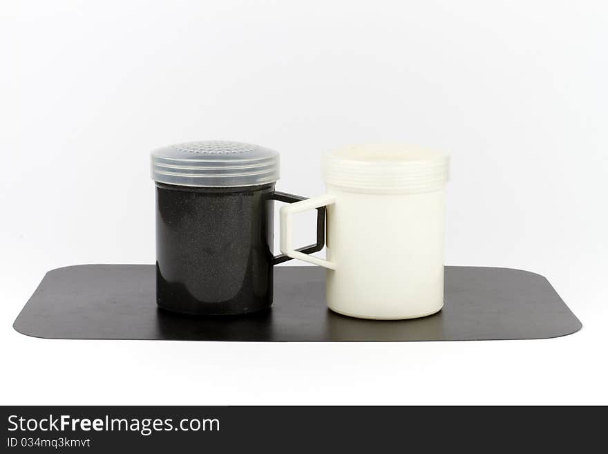 Black and white salt and pepper shakers