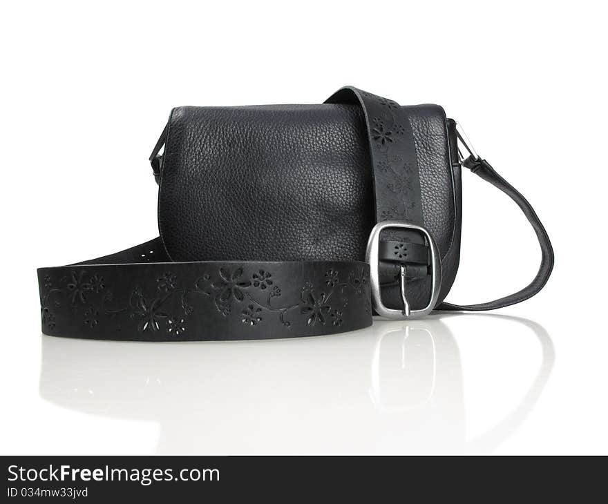 Simple handbag and and belt in black leather on white. Simple handbag and and belt in black leather on white