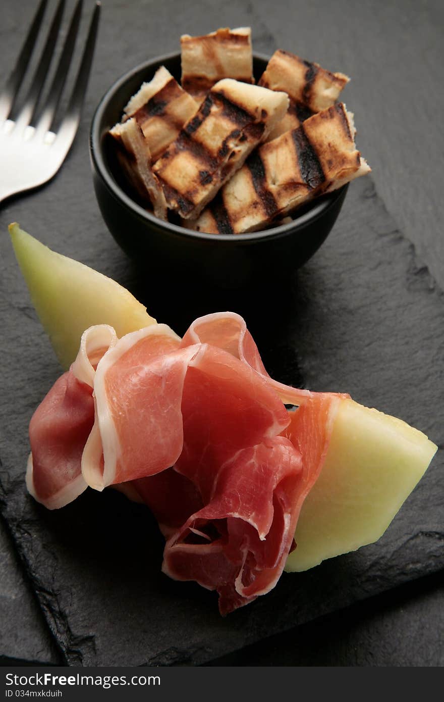 Delicious dinner of ham (prosciutto) and melon. Delicious dinner of ham (prosciutto) and melon