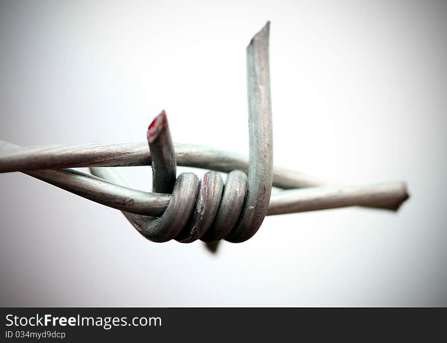 Closeup shot of barb wire looking beautiful. Closeup shot of barb wire looking beautiful.